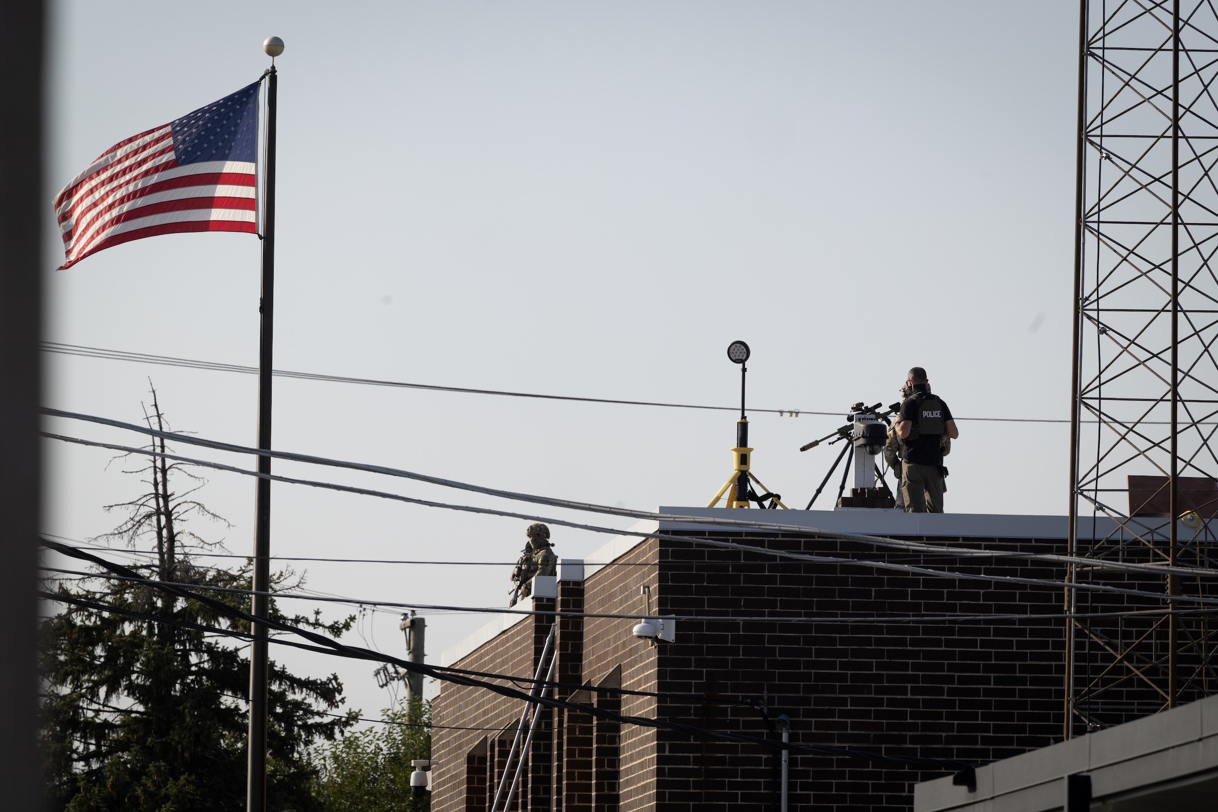 Video Shows ICE Agents Shooting Protesting Pastor With Pepper Ball From Rooftop